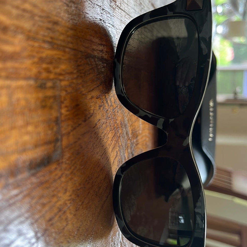 Valentino sun glasses with camouflaged arms.